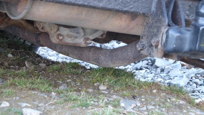 Oh dear. Exhaust is rather vulnerable. This isn't a deep rut.